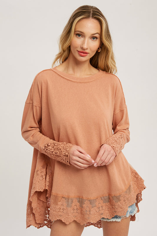 Tunic in ginger color with lace trim, side slits, size small to large.