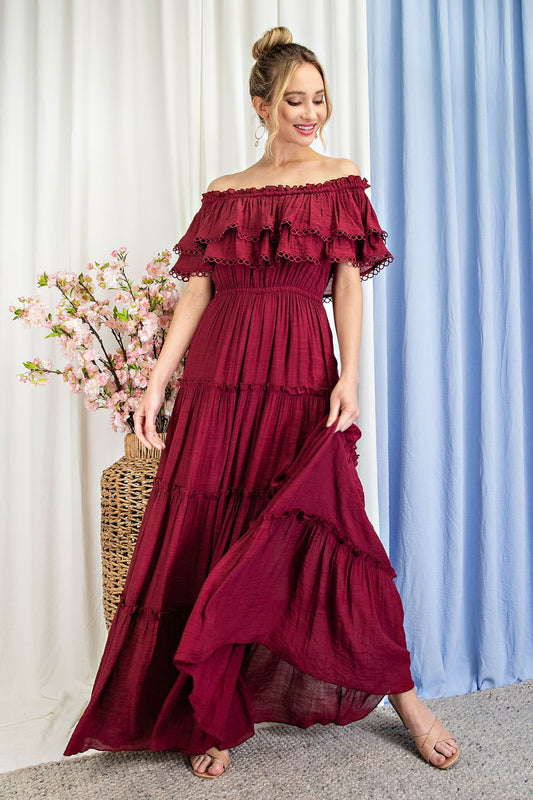 Maxi dress in wine color, off shoulder, skirt has tiers and lining.  Size small to extra large.