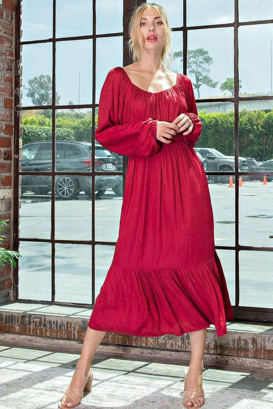 Wine colored midi dress with tiers, a square neckline and long sleeves, size small to large.