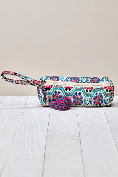Multi colored cosmetic bag with tassel on the zipper.  Colors are cream, red, blue, green and red.